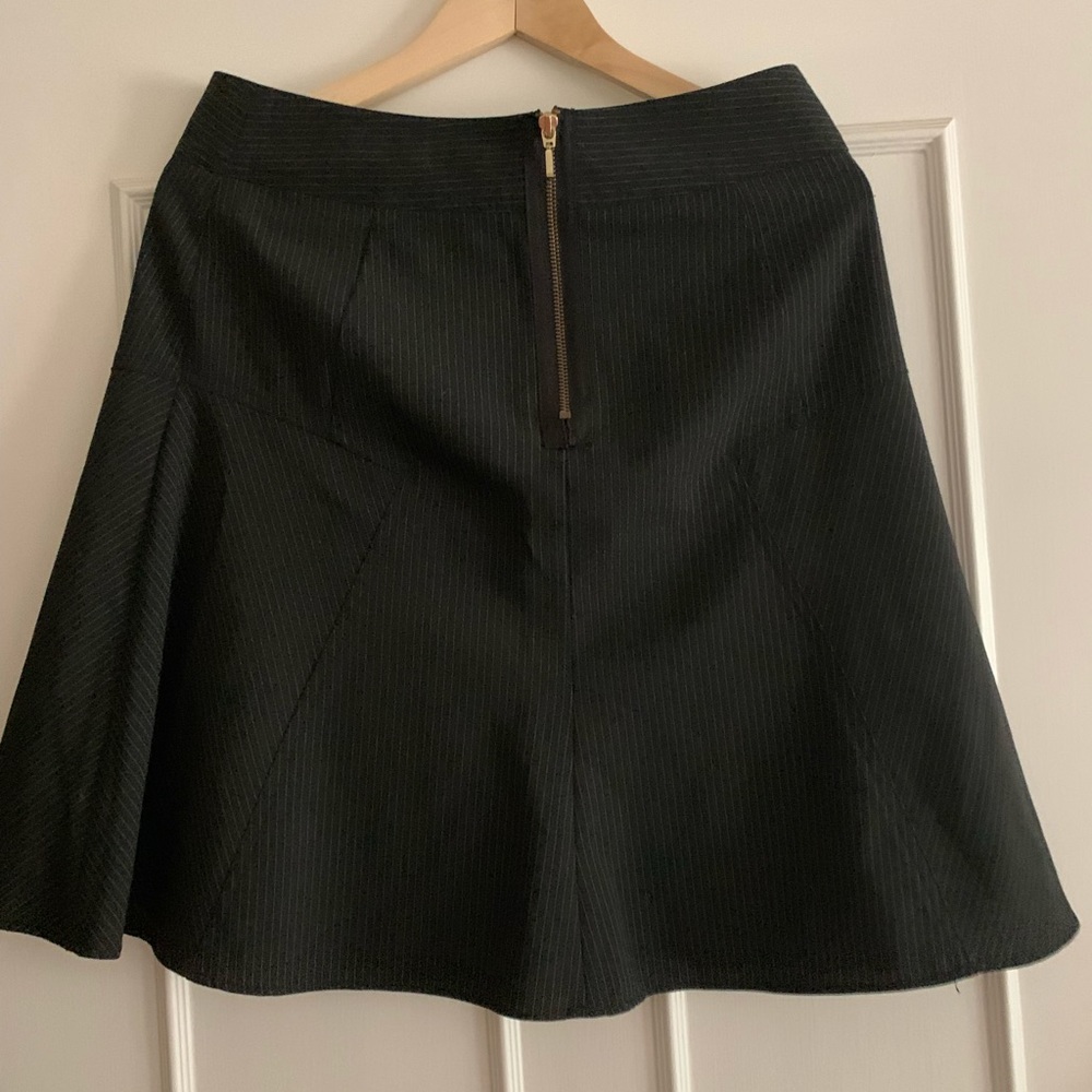 Black vertical striped knee length flattering  skirt